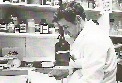 Hugh Campbell, biology professor, reviewing notes in 1980.